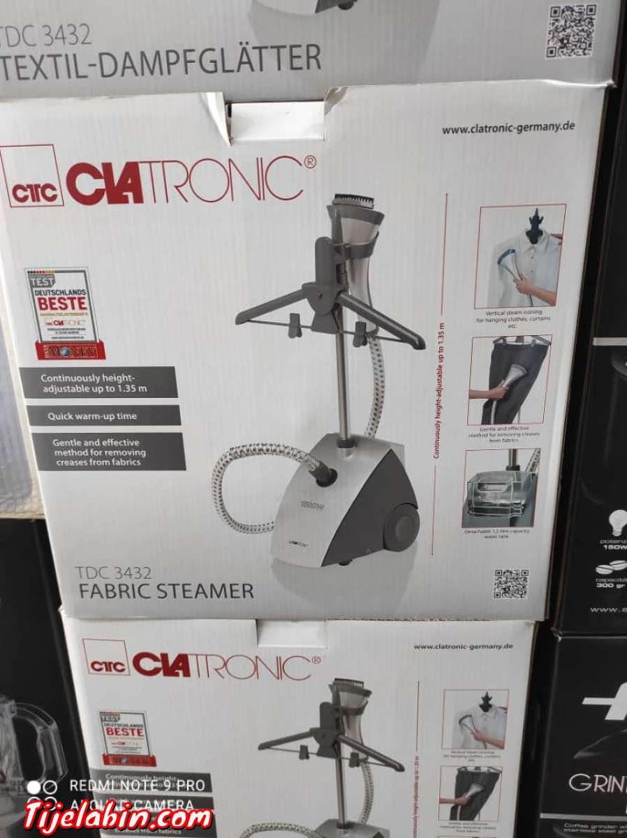 آلة البخار لكي الملابس والستائر مع خاصية الكي بشكل عمودي