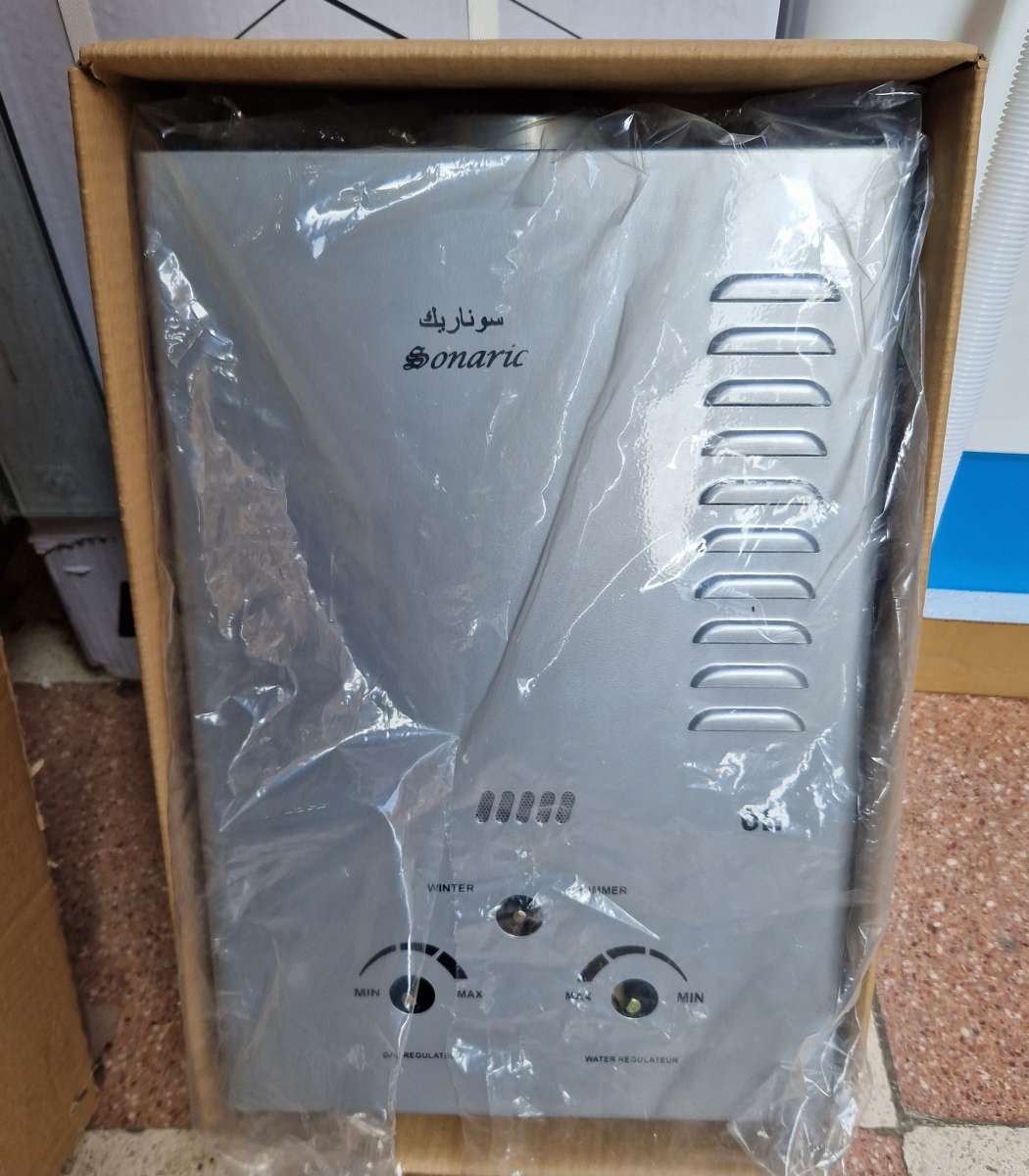 Chauffe bain de la marque Sonaric 6L Garantie 24 mois  Coule