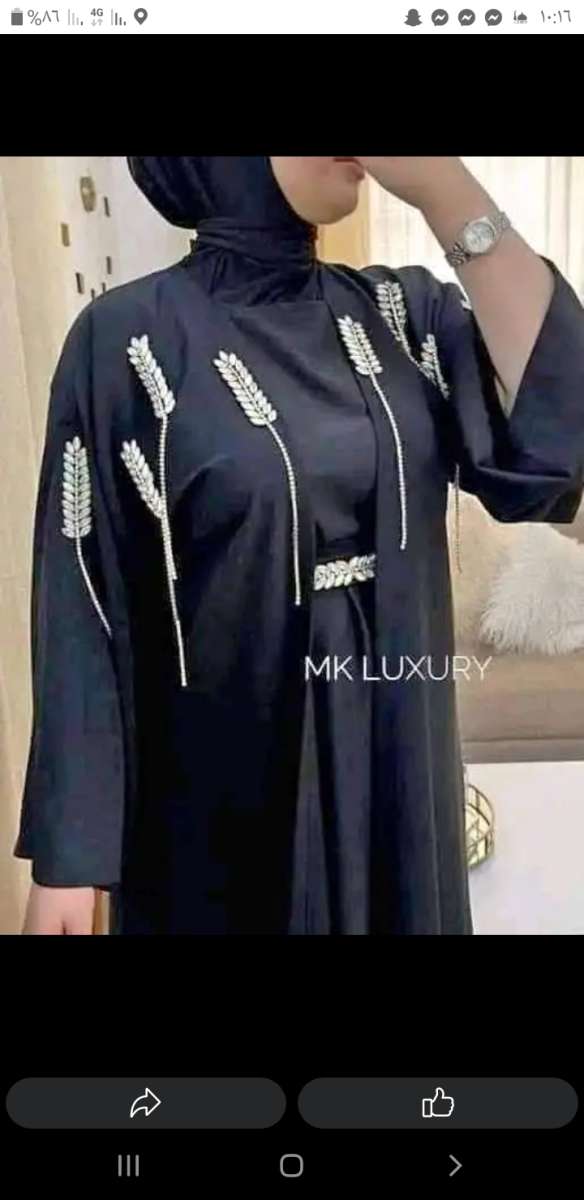 عباءة وصندالة