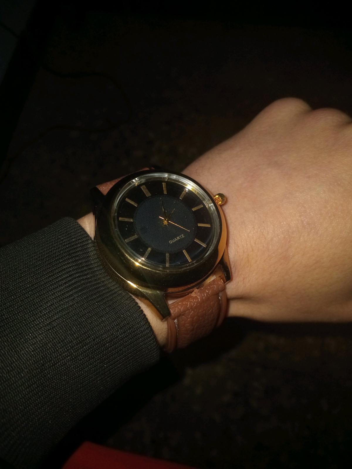 ساعة انيقة بولاعة