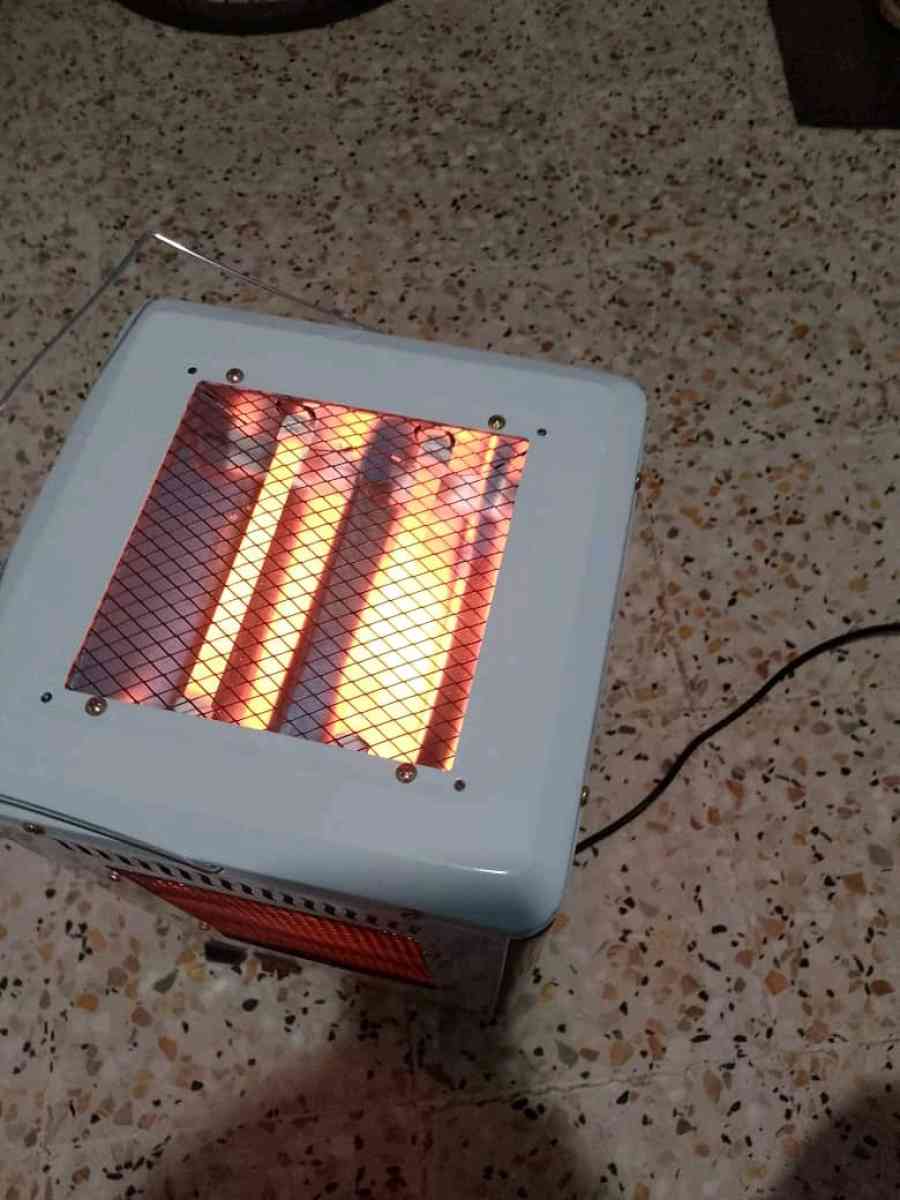 مدفأة  موقد طهي من الأعلى 2في1  REVOLTEC 2000W