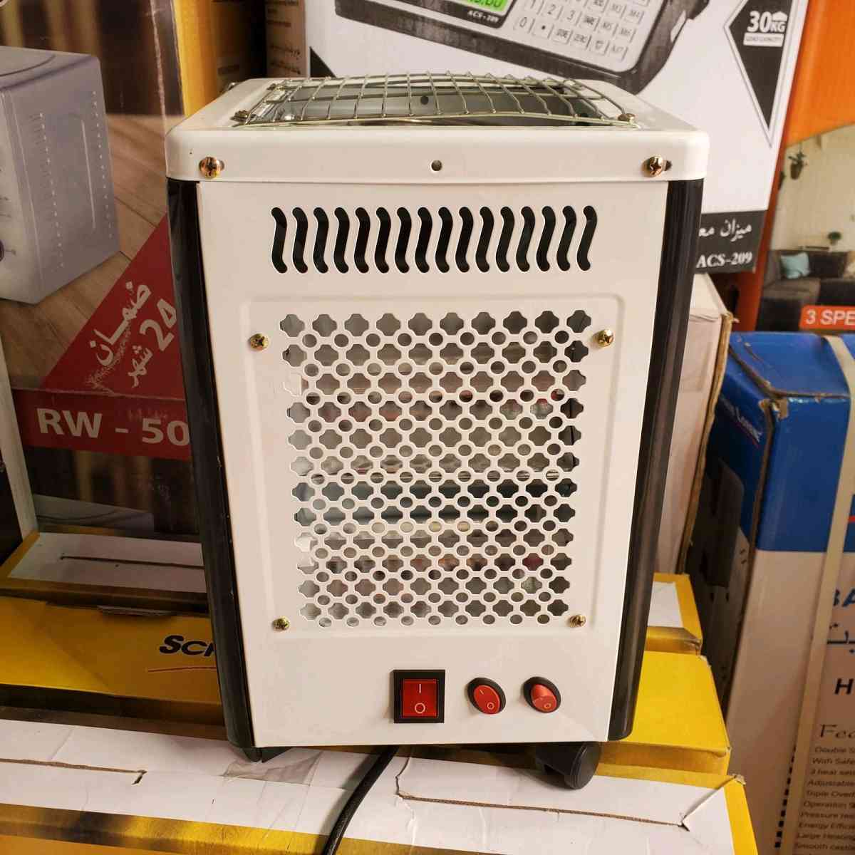 مدفأة  موقد طهي من الأعلى 2في1  REVOLTEC 2000W