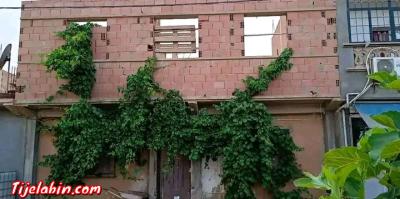 سكن بحي عين مصباح تيارت للبيع أو للتبادل